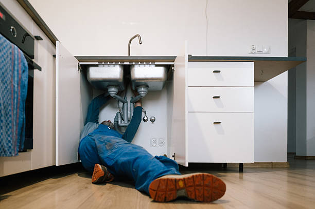Professional Plumbing technician working in Woodlawn, OH